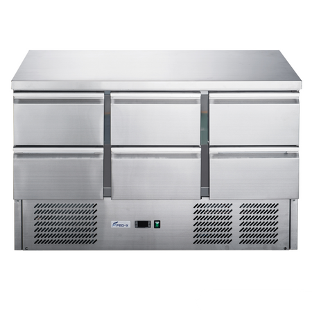 Stainless steel refrigerator with three doors on a white background